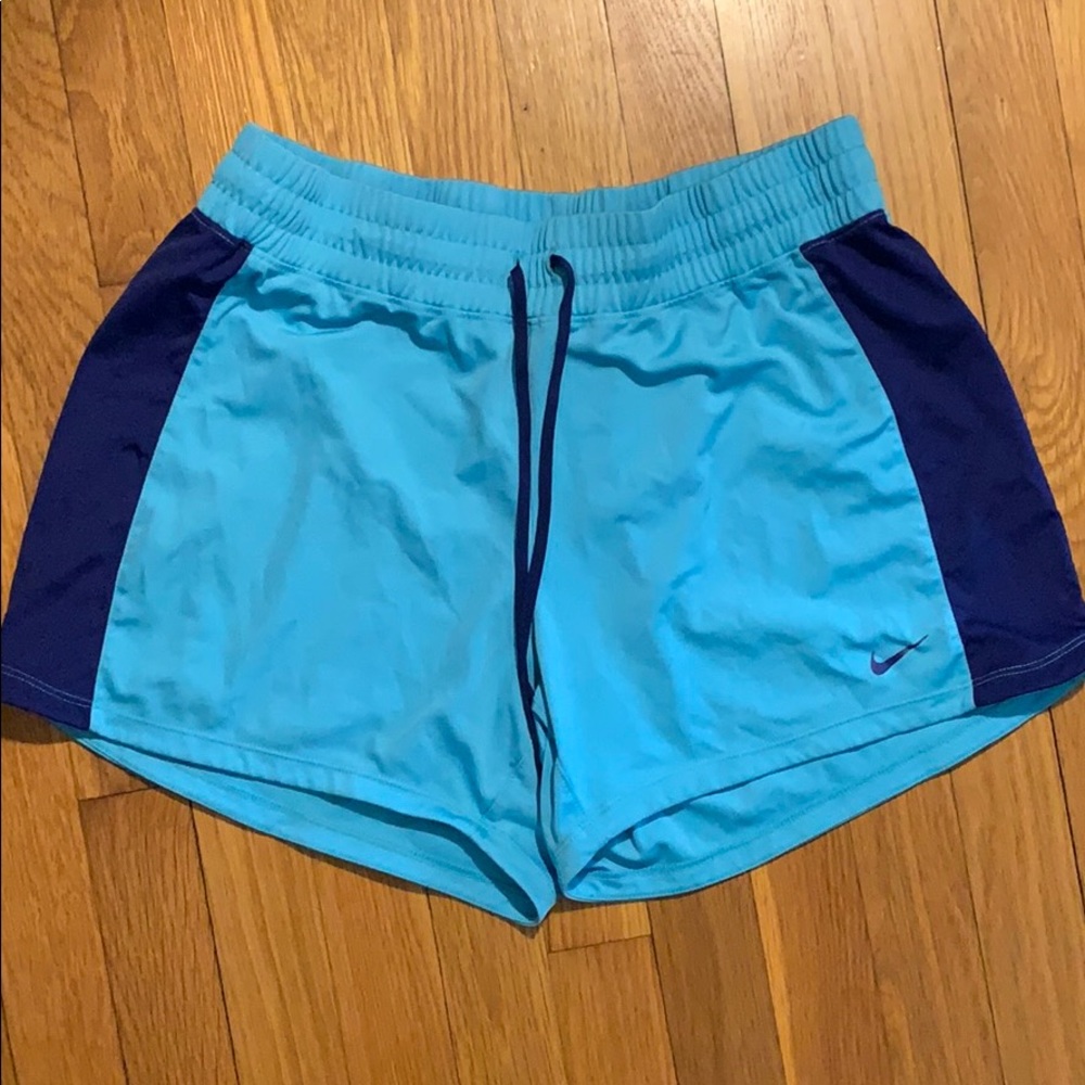 Blue Nike athletic shorts